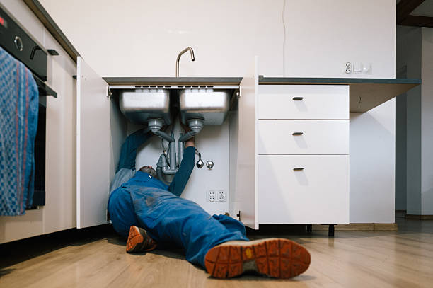 Professional Drain Cleaning technician working in Zavalla, TX